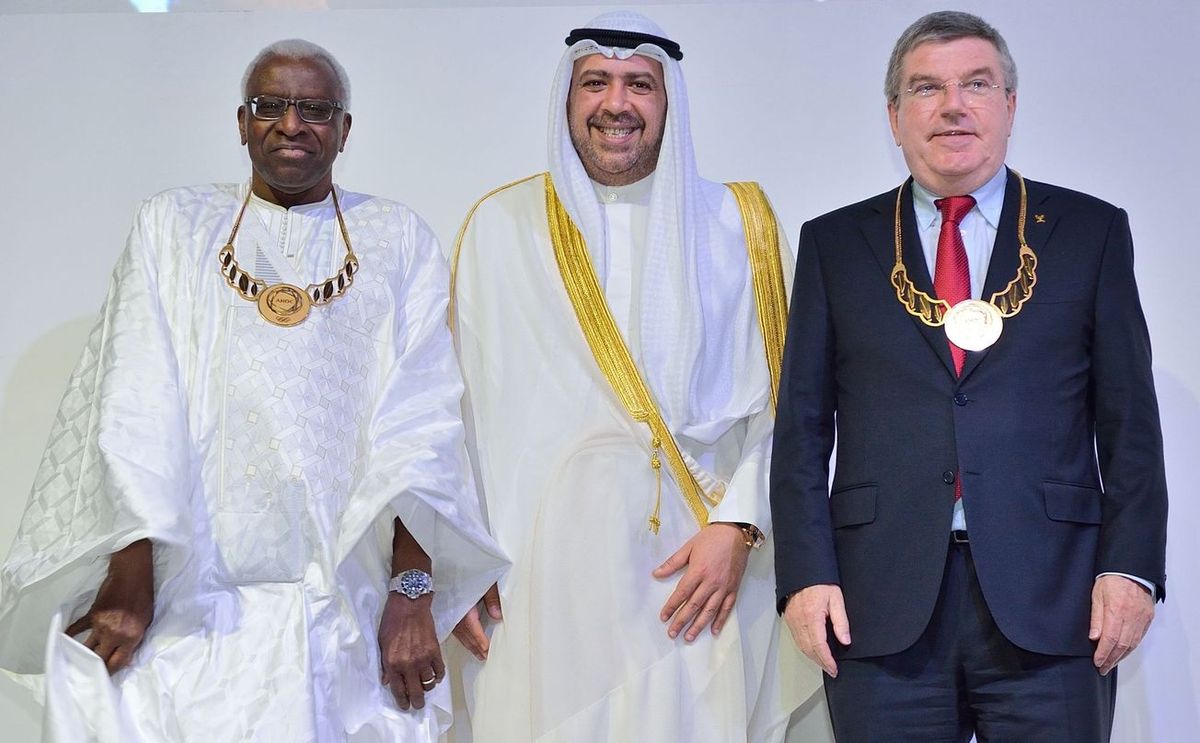 Olympic family: Long-time allies Lamine Diack (convicted), Sheikh Ahmad (convicted), Thomas Bach. (Photo: ANOC)